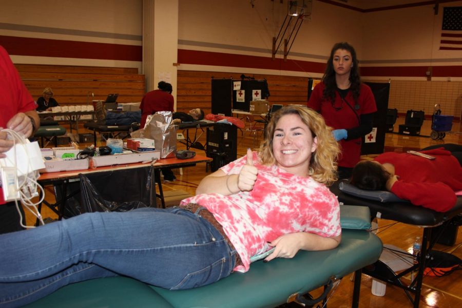 Senior Kayla Albert gets ready to give blood.