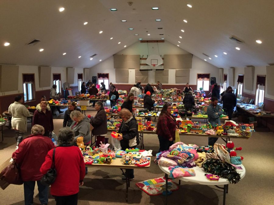 Shoppers browse the  selection of toys donated to Mrs. Elford’s fifth annual toy sale. All proceeds were donated to a shelter for domestic and sexual abuse. 

