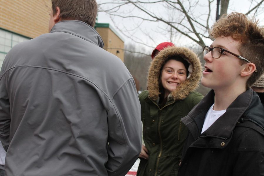 Sophomore Riley Lewis and Sophomore Calla Martin partaking in the walk out on March 14th. 