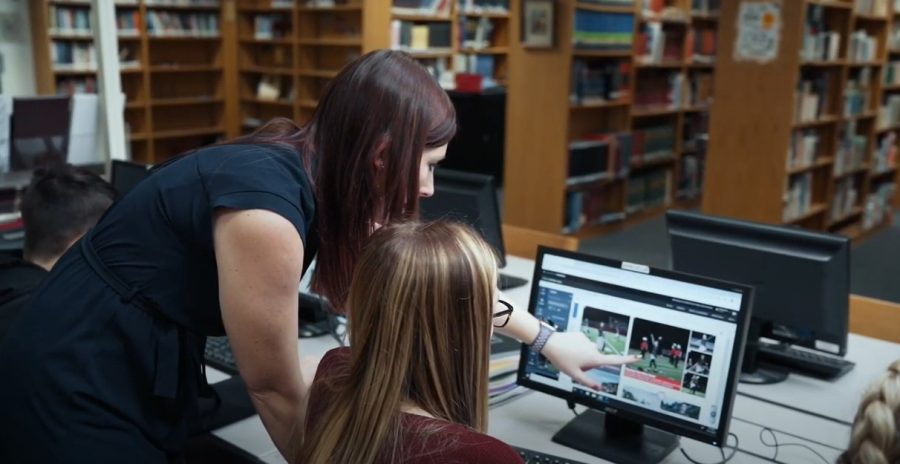 Mrs. Adams and Emmalee Henthorn use LayoutPro, Jostens new yearbook design software. Both were featured in Jostens promo video, sent to all schools who would be using the software the next school year.